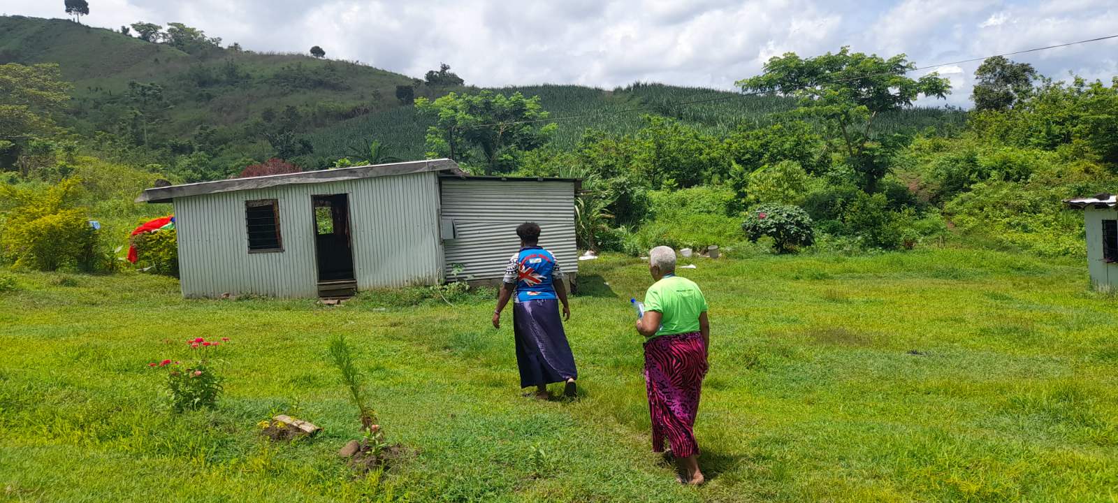 A scabies survey skin examiner visiting a household in the Western Division of Fiji, 2021 World Scabies Program