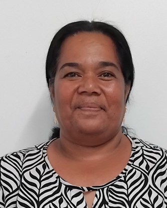 Head shot photo of Miiri Tong who is smiling with her hair pulled back and wearing a black and white top